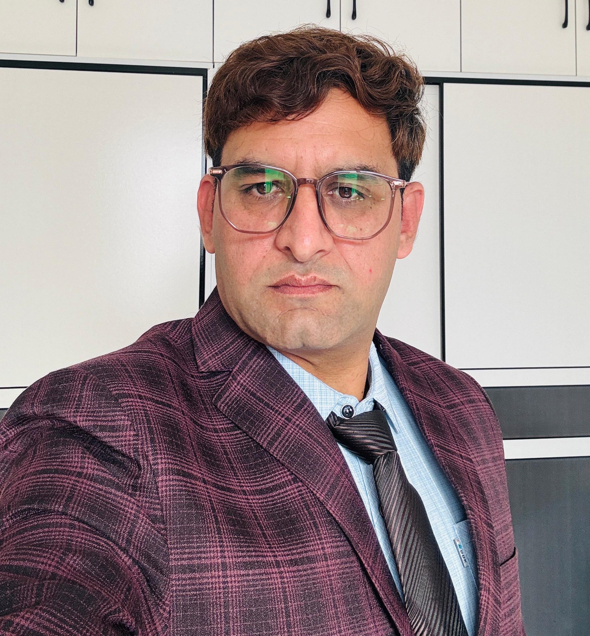 Mr. Akbar Ali, M.Phil